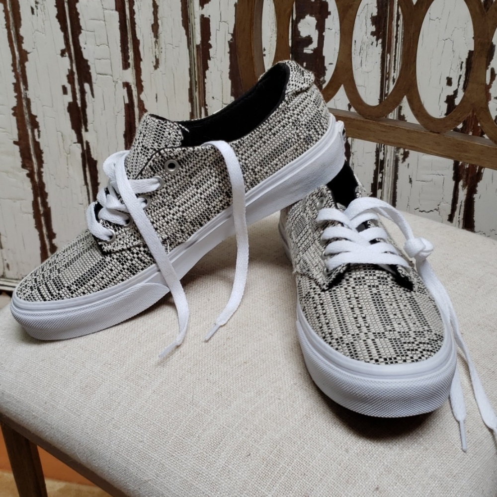 Cream and black vans